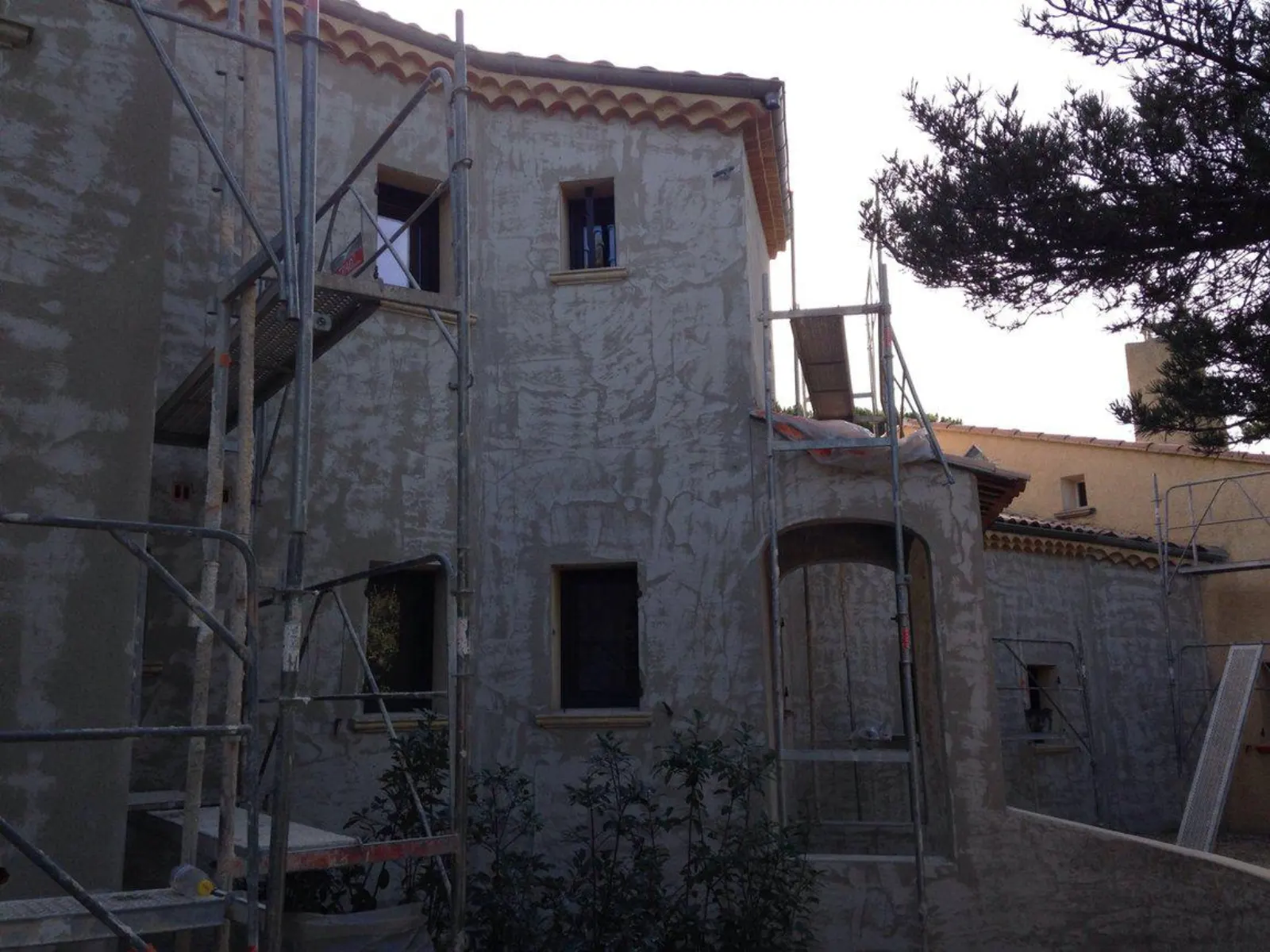 Pose d'enduit de façade